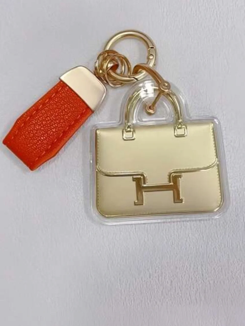 Gold H Handbag Charm Keychain with Bright Orange Strap
